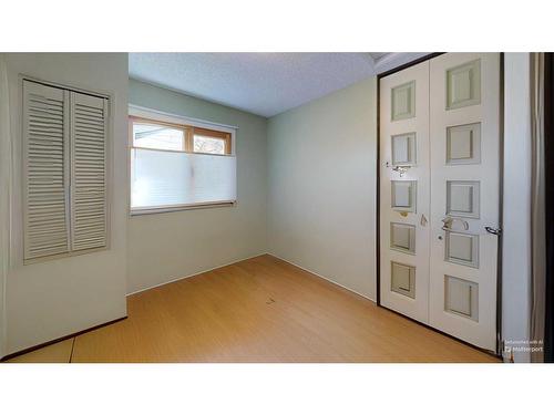 103 Slade Drive, Nanton, AB - Indoor Photo Showing Other Room