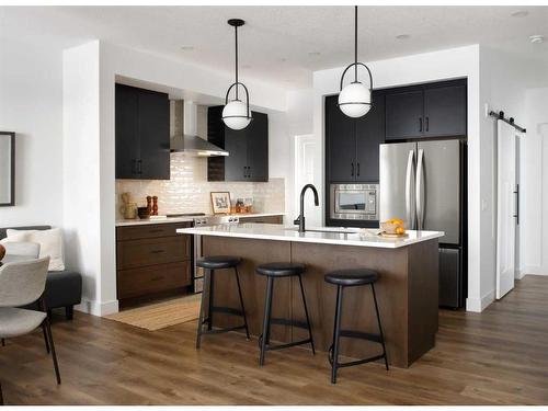 179 Sugarsnap Way Se, Calgary, AB - Indoor Photo Showing Kitchen With Upgraded Kitchen