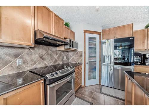 1044 Kincora Drive Nw, Calgary, AB - Indoor Photo Showing Kitchen With Stainless Steel Kitchen