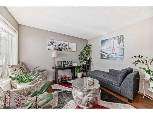 1044 Kincora Drive Nw, Calgary, AB - Indoor Photo Showing Living Room