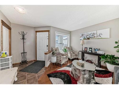 1044 Kincora Drive Nw, Calgary, AB - Indoor Photo Showing Living Room