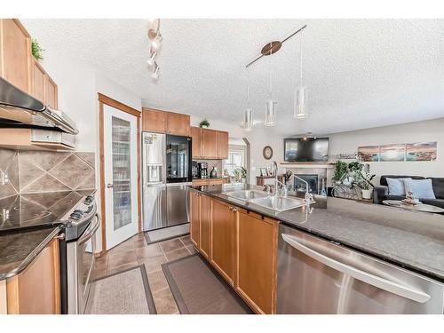 1044 Kincora Drive Nw, Calgary, AB - Indoor Photo Showing Kitchen With Stainless Steel Kitchen With Double Sink