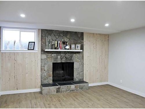 427 Cedarpark Drive Sw, Calgary, AB - Indoor With Fireplace