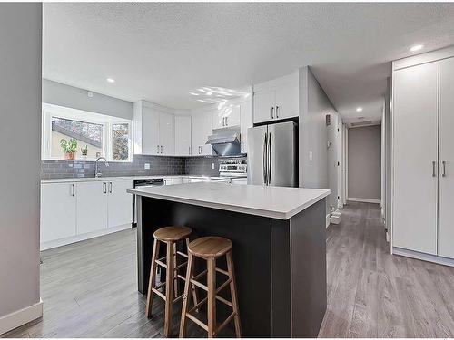 427 Cedarpark Drive Sw, Calgary, AB - Indoor Photo Showing Kitchen With Upgraded Kitchen