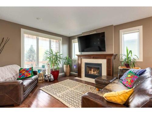 6616 Bowness Road Nw, Calgary, AB - Indoor Photo Showing Living Room With Fireplace