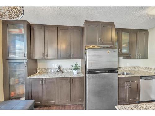 703-733 14Th Avenue Sw, Calgary, AB - Indoor Photo Showing Kitchen With Double Sink