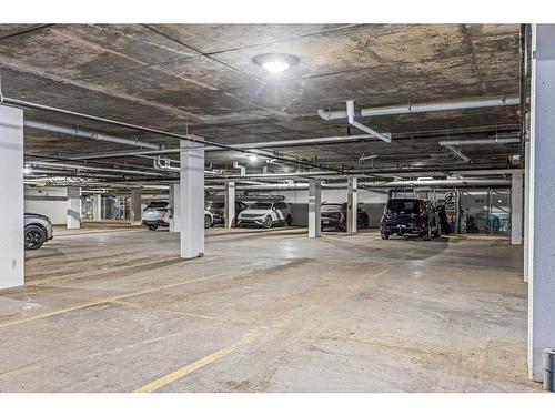 306-1315 Spring Creek Gate, Canmore, AB - Indoor Photo Showing Garage