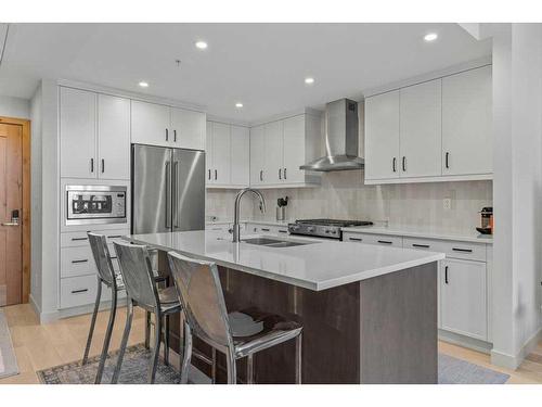 306-1315 Spring Creek Gate, Canmore, AB - Indoor Photo Showing Kitchen