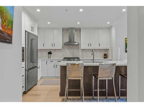 306-1315 Spring Creek Gate, Canmore, AB - Indoor Photo Showing Kitchen With Upgraded Kitchen