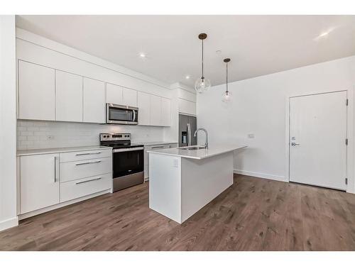 1304-60 Skyview Ranch Road Ne, Calgary, AB - Indoor Photo Showing Kitchen With Stainless Steel Kitchen With Upgraded Kitchen