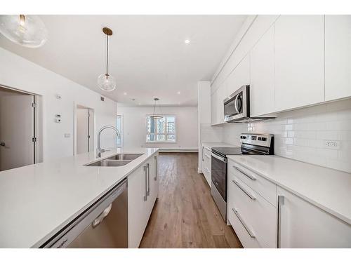 1304-60 Skyview Ranch Road Ne, Calgary, AB - Indoor Photo Showing Kitchen With Double Sink With Upgraded Kitchen