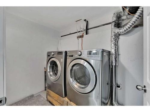 73 Martinvalley Crescent Ne, Calgary, AB - Indoor Photo Showing Laundry Room