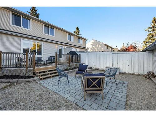 151 Somme Manor Sw, Calgary, AB - Outdoor With Deck Patio Veranda