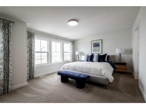 136 Sora Terrace Se, Calgary, AB - Indoor Photo Showing Bedroom