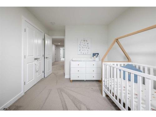 136 Sora Terrace Se, Calgary, AB - Indoor Photo Showing Bedroom