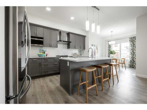 136 Sora Terrace Se, Calgary, AB - Indoor Photo Showing Kitchen With Upgraded Kitchen