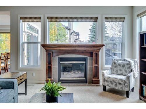 122 Cranridge Heights Se, Calgary, AB - Indoor Photo Showing Living Room With Fireplace