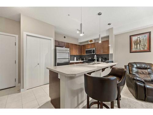 2219-604 East Lake Boulevard Ne, Airdrie, AB - Indoor Photo Showing Kitchen With Upgraded Kitchen