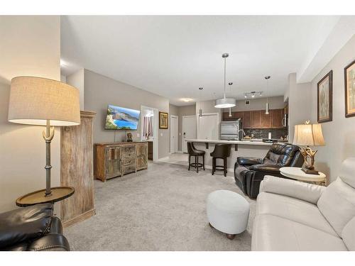 2219-604 East Lake Boulevard Ne, Airdrie, AB - Indoor Photo Showing Living Room