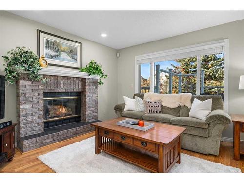 28 Macewan Park Close Nw, Calgary, AB - Indoor Photo Showing Living Room With Fireplace