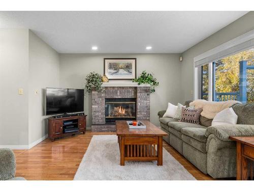 28 Macewan Park Close Nw, Calgary, AB - Indoor Photo Showing Living Room With Fireplace