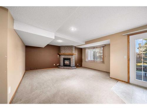 28 Macewan Park Close Nw, Calgary, AB - Indoor With Fireplace