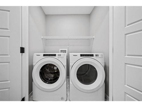 170 Dawson Harbour Rise, Chestermere, AB - Indoor Photo Showing Laundry Room