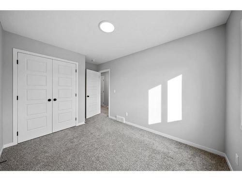 170 Dawson Harbour Rise, Chestermere, AB - Indoor Photo Showing Other Room