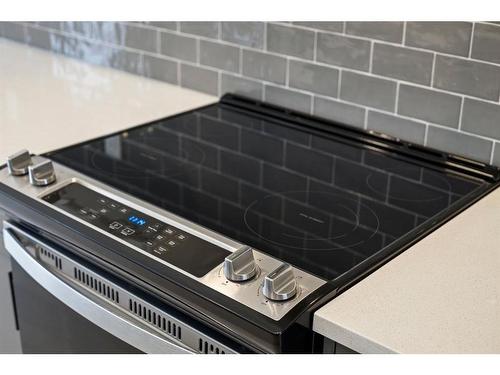 170 Dawson Harbour Rise, Chestermere, AB - Indoor Photo Showing Kitchen