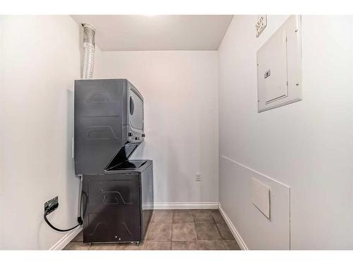 4205-24 Hemlock Crescent Sw, Calgary, AB - Indoor Photo Showing Laundry Room