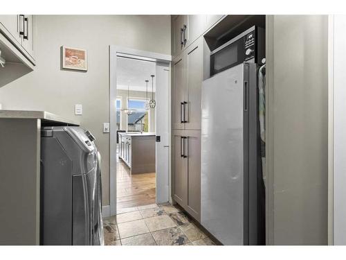 209 Hidden Creek Road Nw, Calgary, AB - Indoor Photo Showing Laundry Room