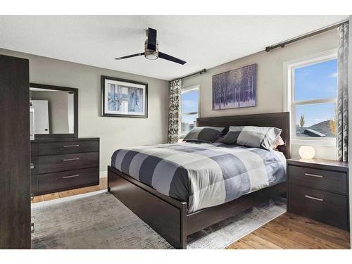 209 Hidden Creek Road Nw, Calgary, AB - Indoor Photo Showing Bedroom