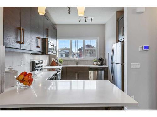 416 Nolan Hill Boulevard Nw, Calgary, AB - Indoor Photo Showing Kitchen With Stainless Steel Kitchen