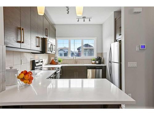 416 Nolan Hill Boulevard Nw, Calgary, AB - Indoor Photo Showing Kitchen With Stainless Steel Kitchen