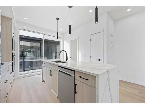 3398 8 Avenue Sw, Calgary, AB - Indoor Photo Showing Kitchen With Double Sink With Upgraded Kitchen