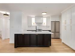 114-777 3 Avenue SW Calgary, AB T2N 0G8