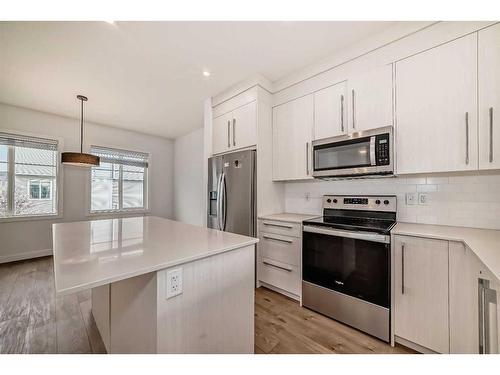 424-669 Savanna Boulevard Ne, Calgary, AB - Indoor Photo Showing Kitchen With Stainless Steel Kitchen With Upgraded Kitchen