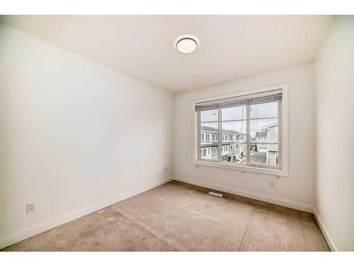 424-669 Savanna Boulevard Ne, Calgary, AB - Indoor Photo Showing Other Room