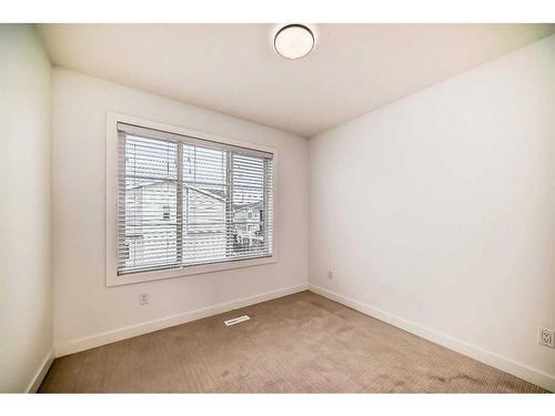 424-669 Savanna Boulevard Ne, Calgary, AB - Indoor Photo Showing Other Room