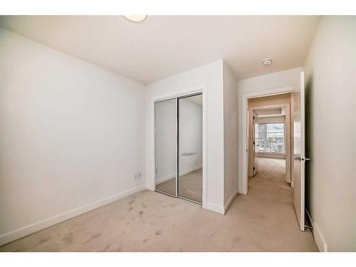 424-669 Savanna Boulevard Ne, Calgary, AB - Indoor Photo Showing Other Room