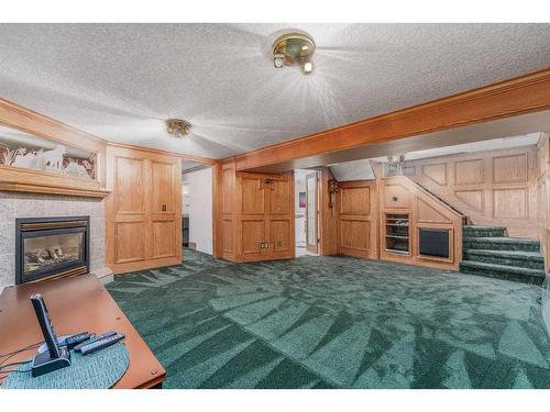 219 Northmount Drive Nw, Calgary, AB - Indoor With Fireplace