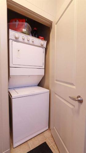 1410-5605 Henwood Street Sw, Calgary, AB - Indoor Photo Showing Laundry Room