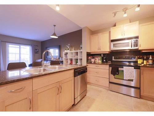 1410-5605 Henwood Street Sw, Calgary, AB - Indoor Photo Showing Kitchen With Double Sink