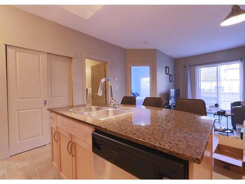 1410-5605 Henwood Street Sw, Calgary, AB - Indoor Photo Showing Kitchen With Double Sink