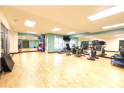 1410-5605 Henwood Street Sw, Calgary, AB - Indoor Photo Showing Gym Room