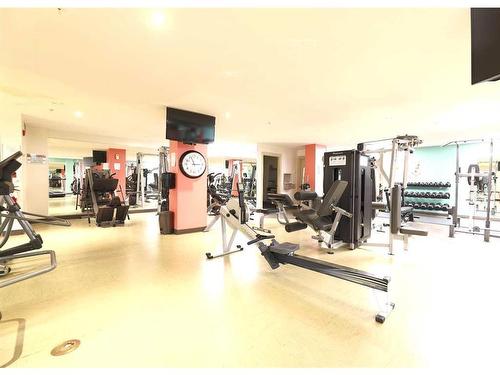 1410-5605 Henwood Street Sw, Calgary, AB - Indoor Photo Showing Gym Room