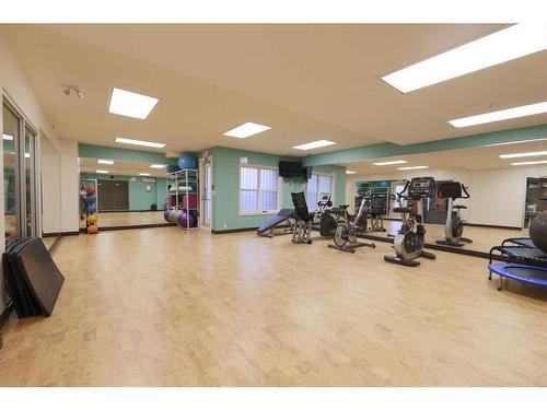 1410-5605 Henwood Street Sw, Calgary, AB - Indoor Photo Showing Gym Room