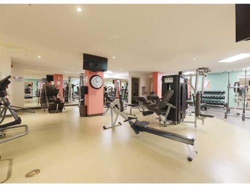 1410-5605 Henwood Street Sw, Calgary, AB - Indoor Photo Showing Gym Room