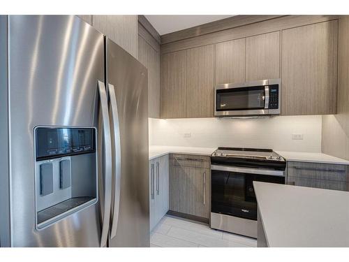 1120-395 Skyview Parkway Ne, Calgary, AB - Indoor Photo Showing Kitchen