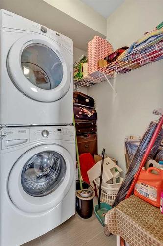 309-214 Sherwood Square Nw, Calgary, AB - Indoor Photo Showing Laundry Room